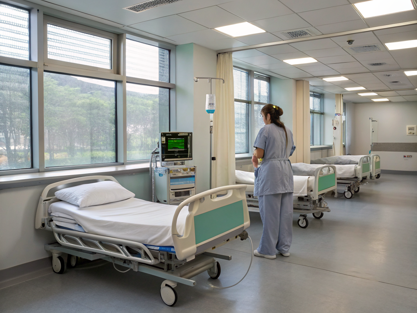 Hospital post-acute virtual care team monitoring patient telemetry